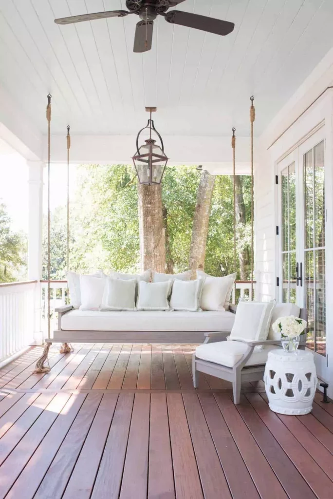 Porch swing hanging with rope and ceiling